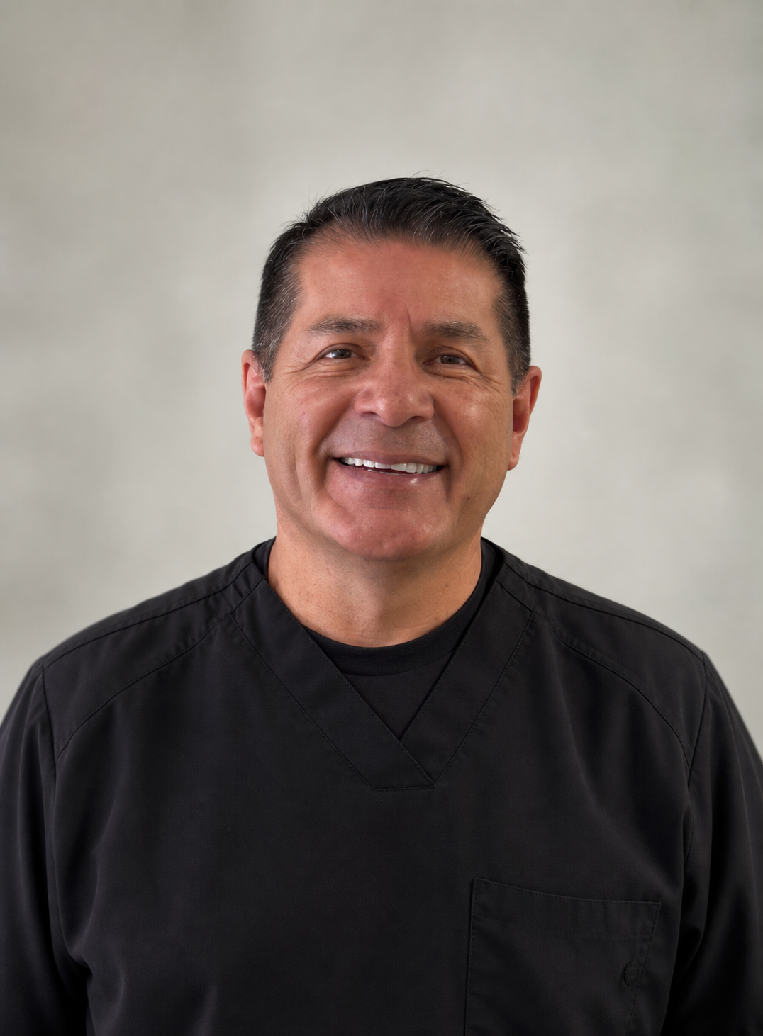 Professional headshot of Santiago Reyes, Registered Dietitian and certified personal trainer
